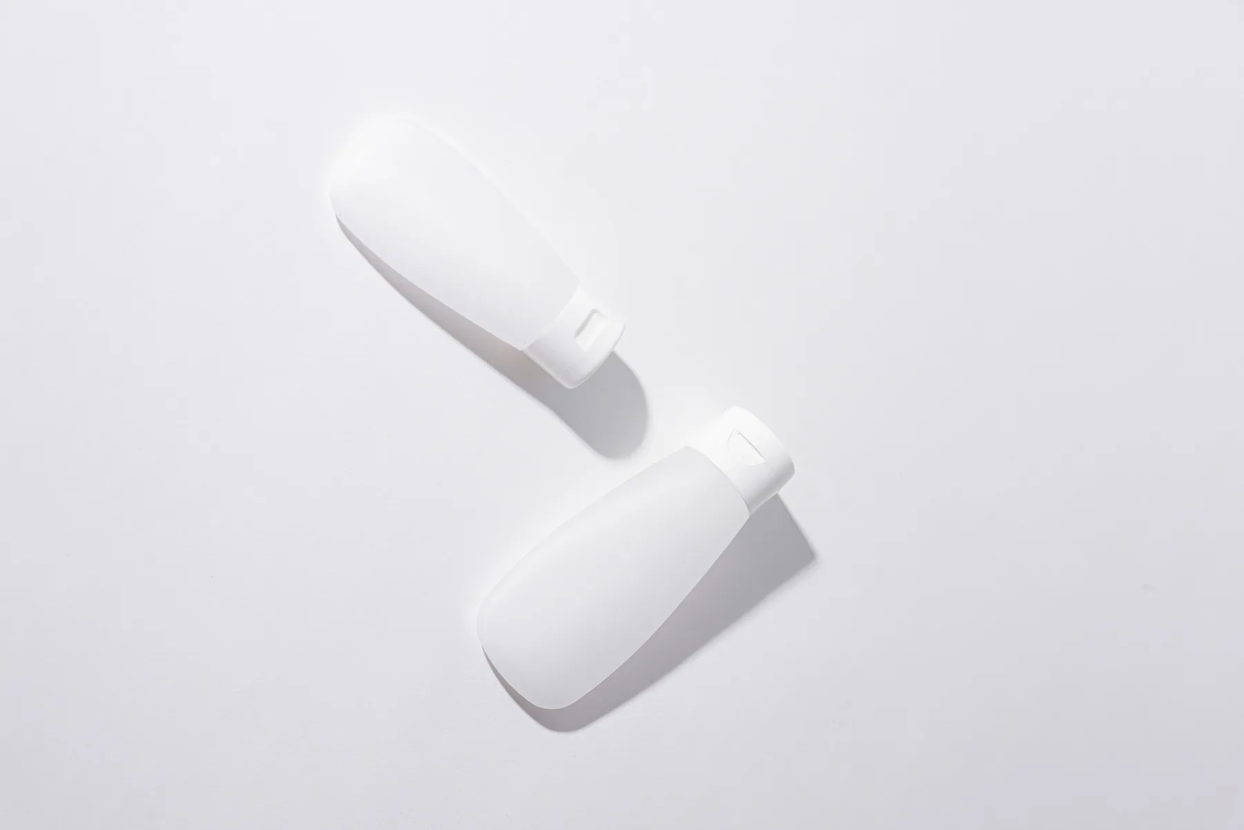 Minimal white personal care packaging