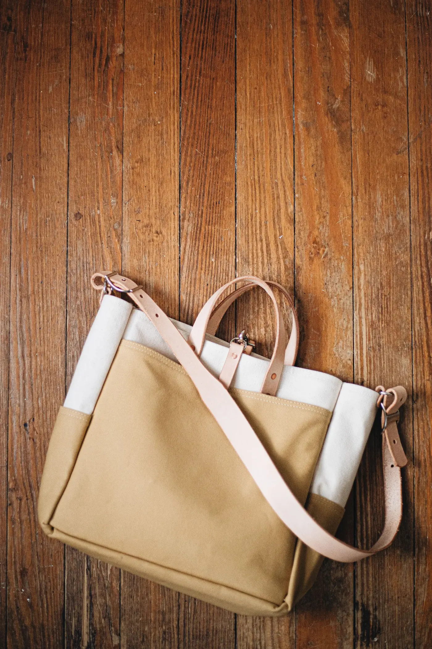 Canvas and leather tote bag representing travel and carry